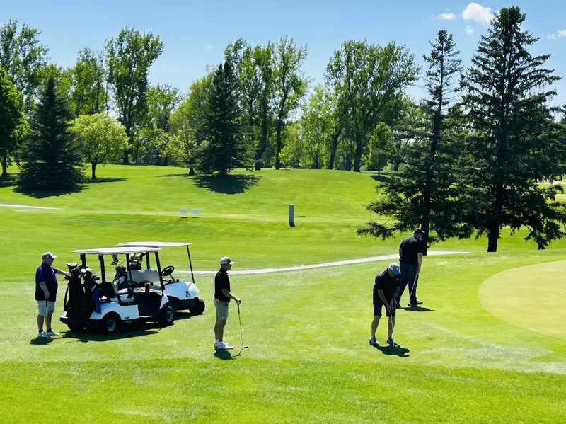 Golfers on the fairway at Hawley Country Club
